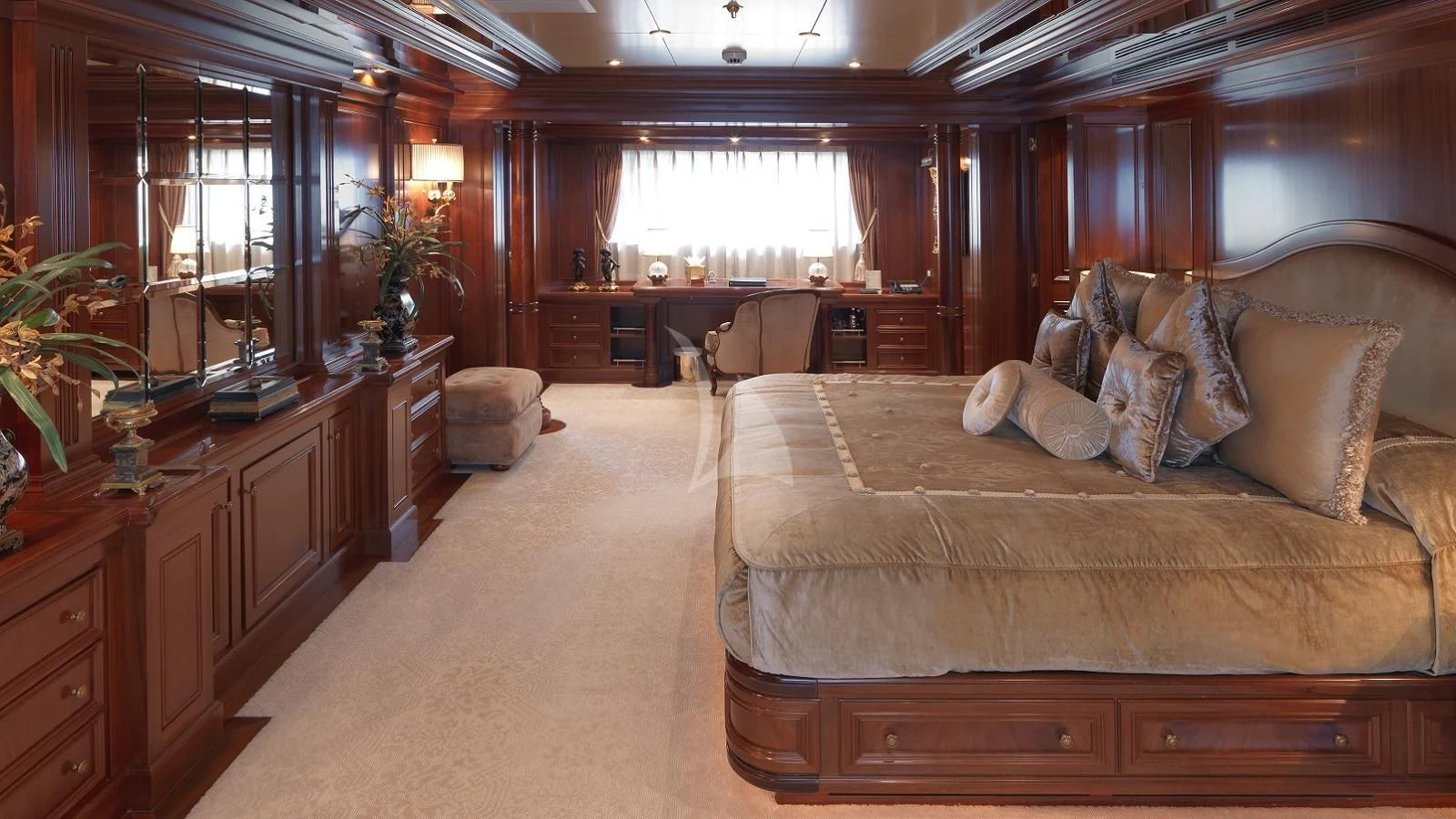 a large living room with a couch aboard APOGEE Yacht for Sale