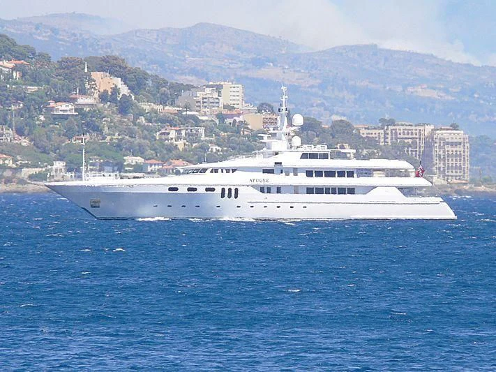 a large white boat in the water aboard APOGEE Yacht for Sale