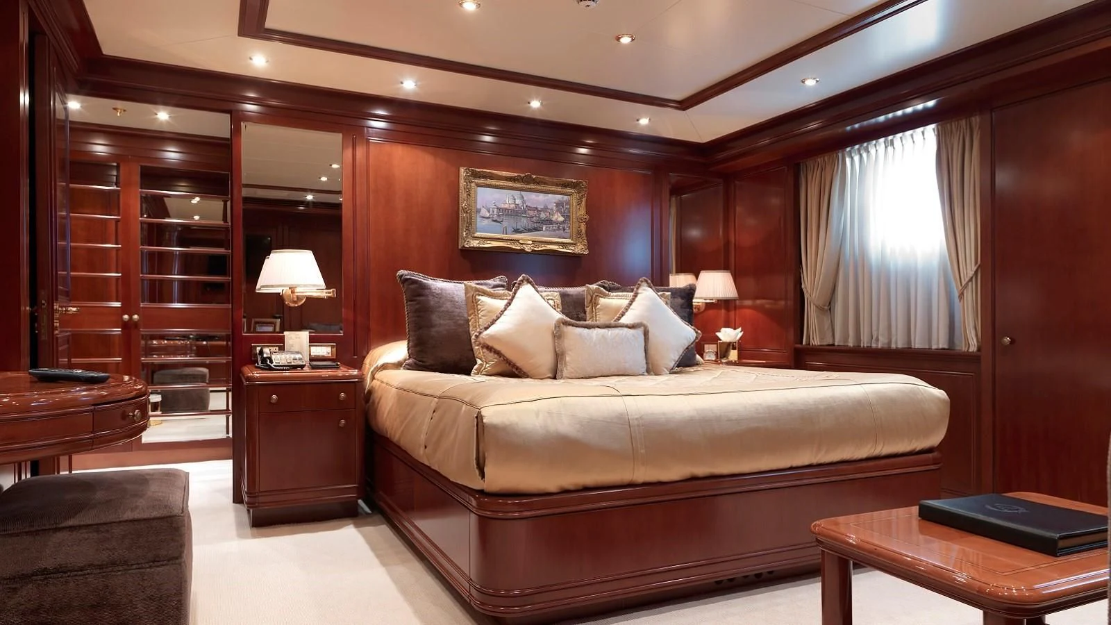 a large bed in a hotel room aboard APOGEE Yacht for Sale
