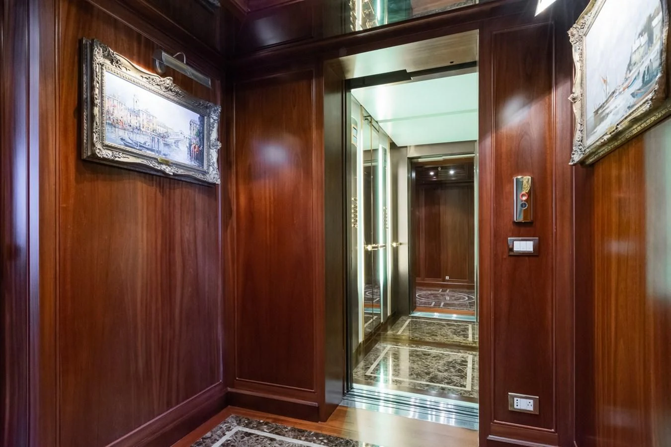 a hallway with wood doors aboard APOGEE Yacht for Sale