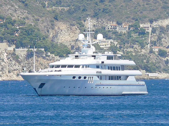 a white boat on the water aboard APOGEE Yacht for Sale
