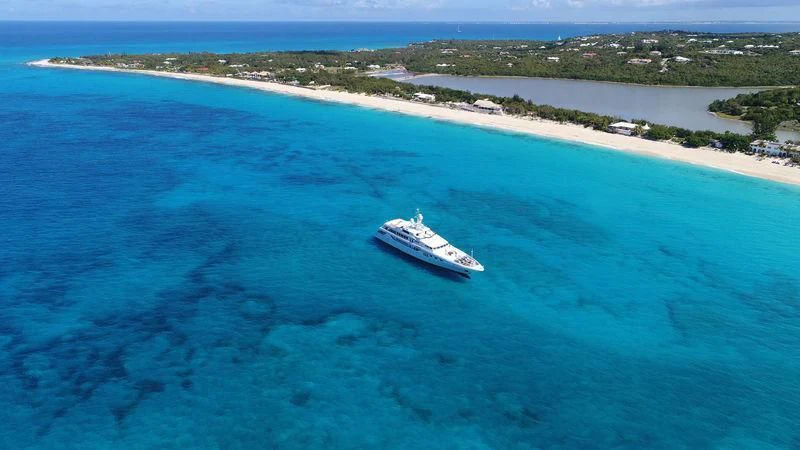 a boat in the water aboard APOGEE Yacht for Sale