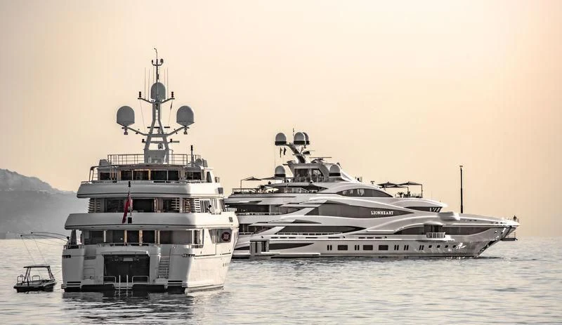 a group of boats in the water aboard APOGEE Yacht for Sale