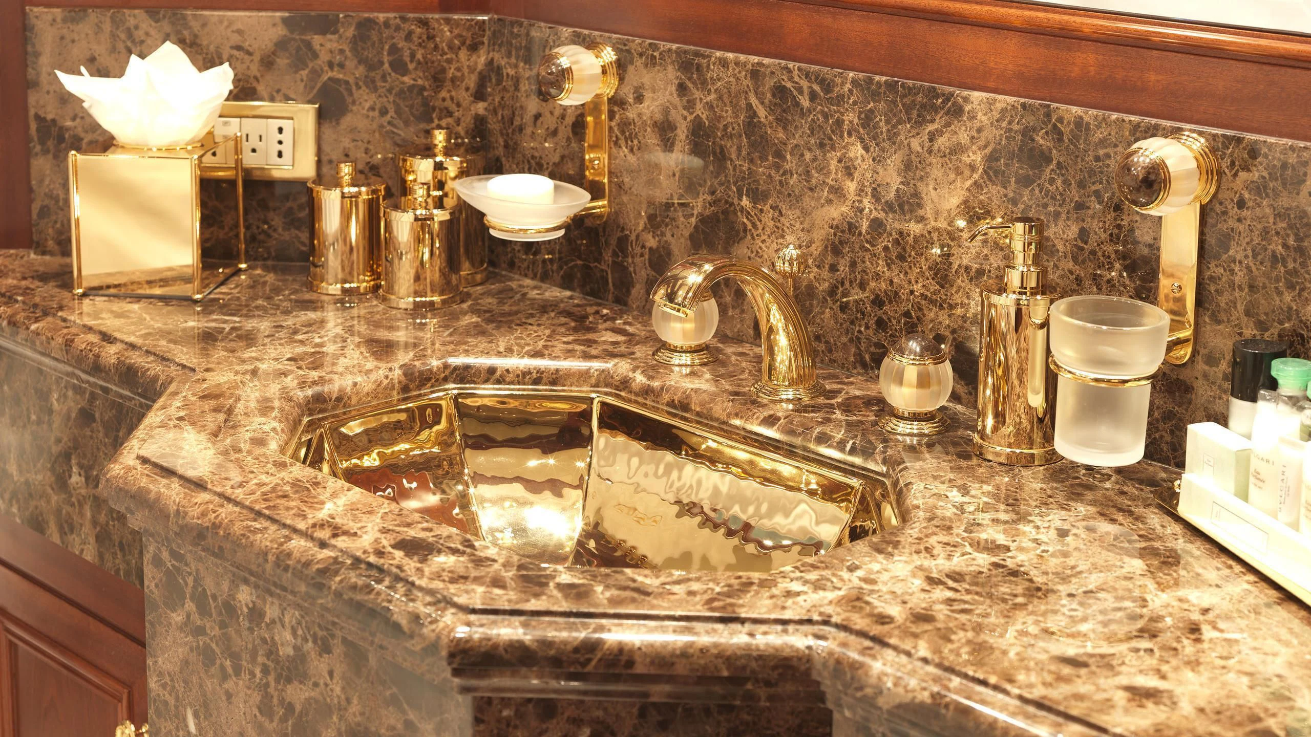 a kitchen counter with a marble counter top aboard APOGEE Yacht for Sale