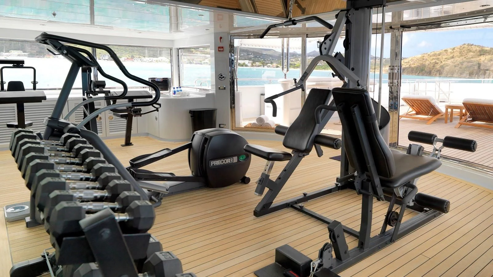 gym with exercise equipment aboard APOGEE Yacht for Sale