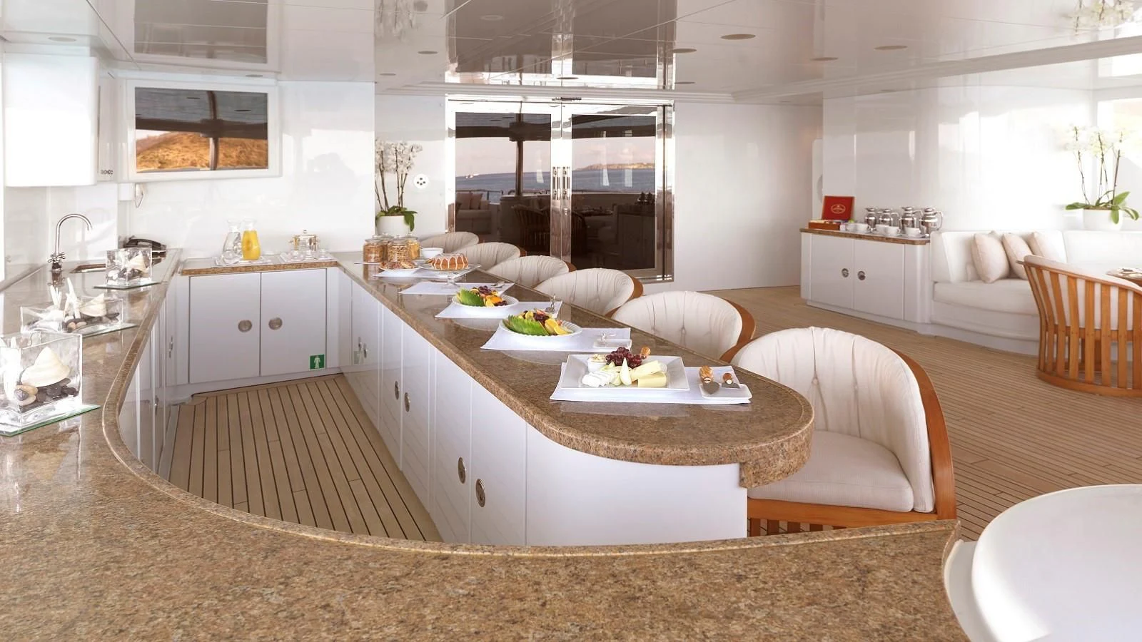 a kitchen with a dining table aboard APOGEE Yacht for Sale