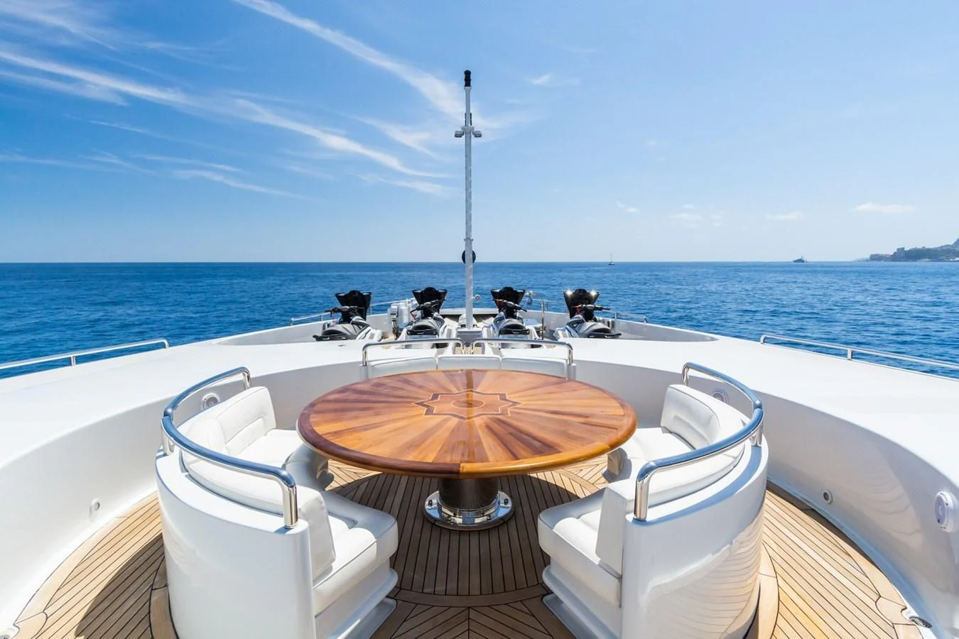 a boat with chairs on it aboard APOGEE Yacht for Sale