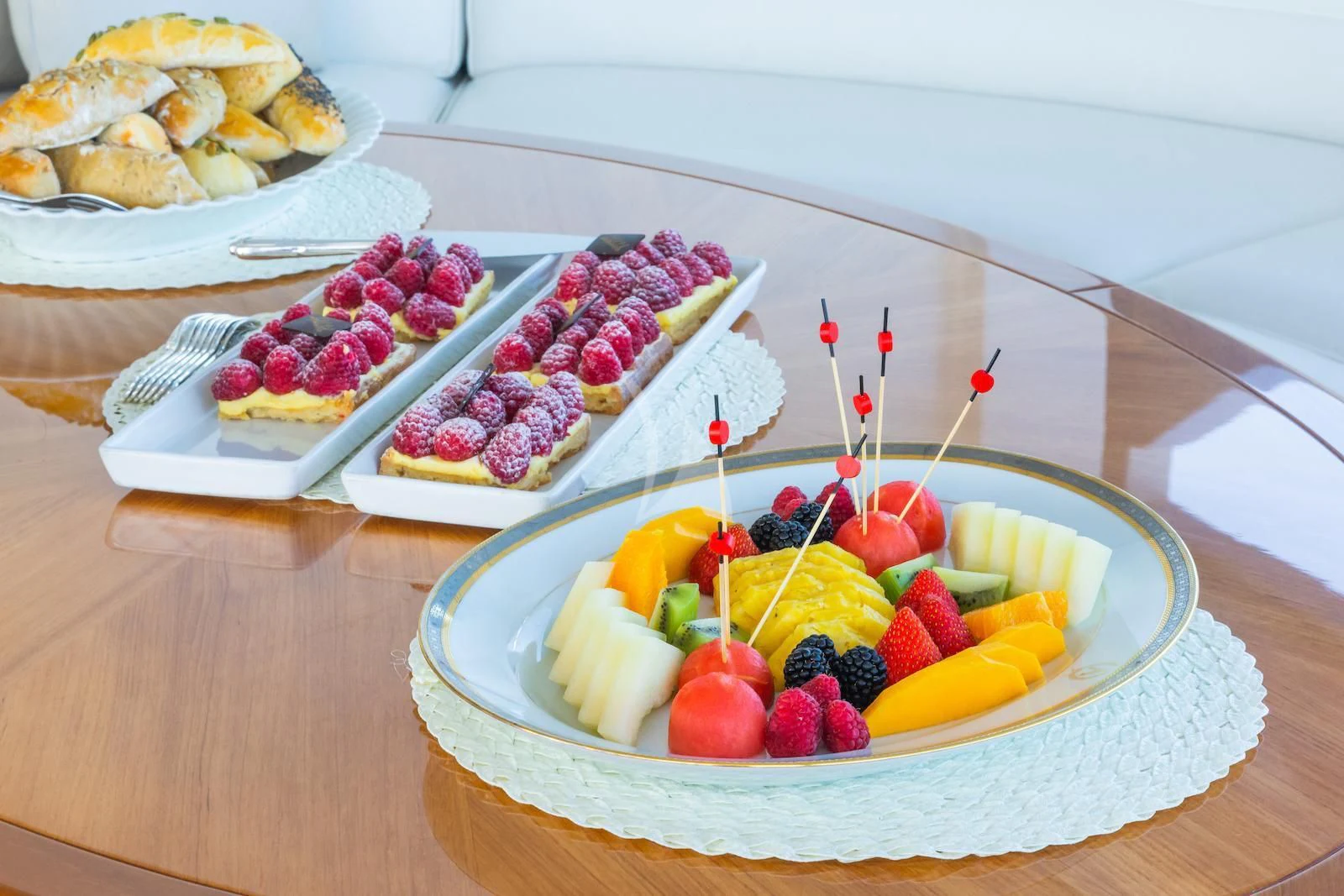 a table with food on it aboard APOGEE Yacht for Sale