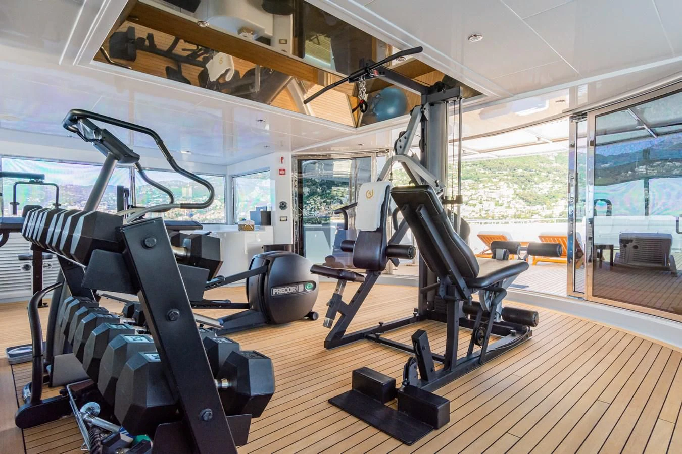 gym with exercise equipment aboard APOGEE Yacht for Sale