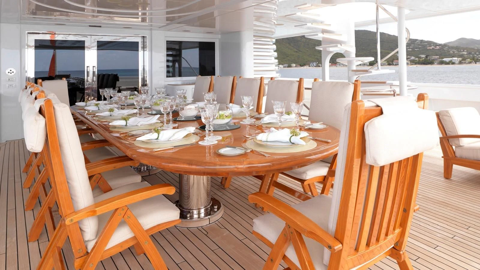 a table set for a meal aboard APOGEE Yacht for Sale