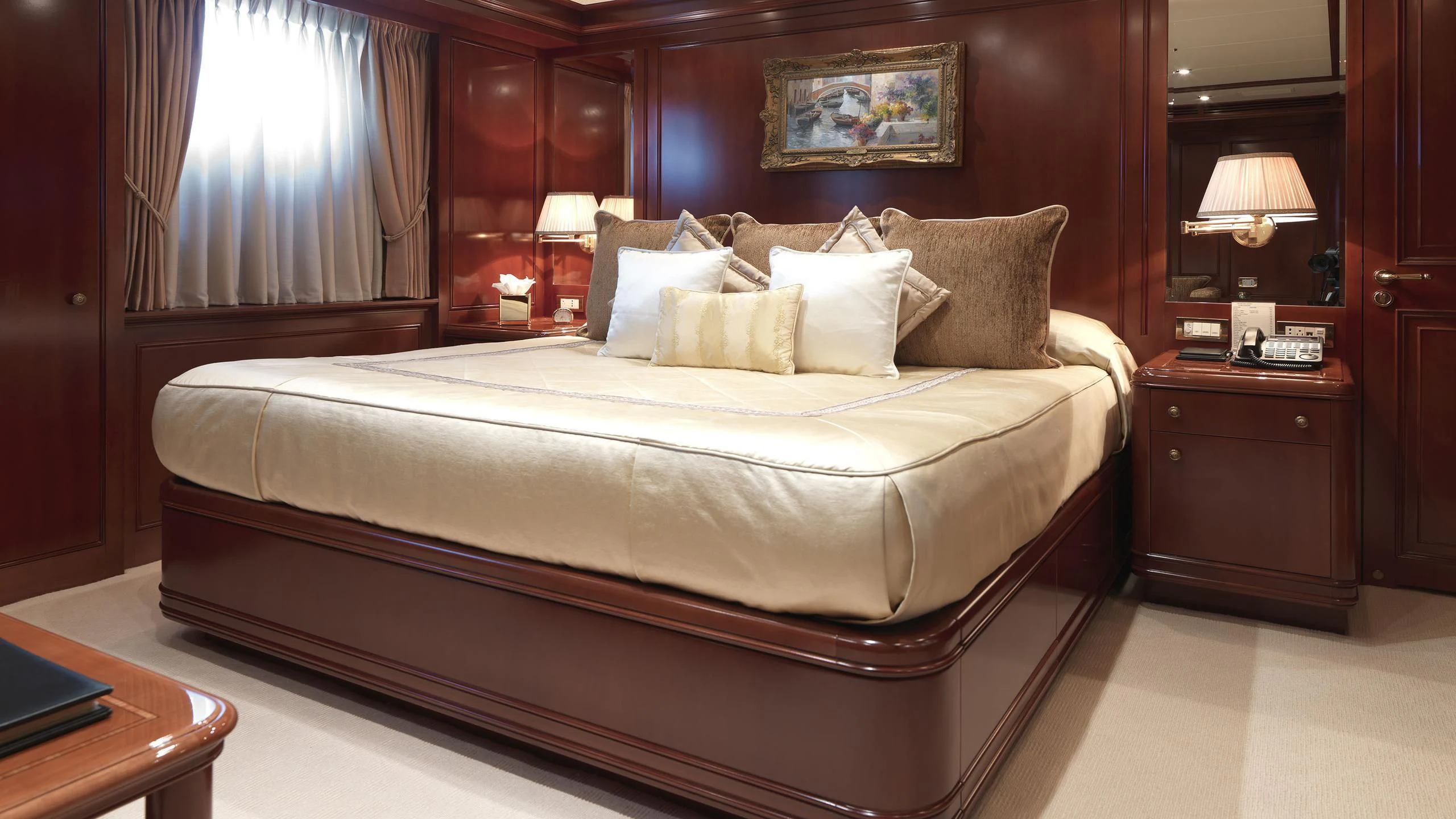 a bed with white sheets aboard APOGEE Yacht for Sale
