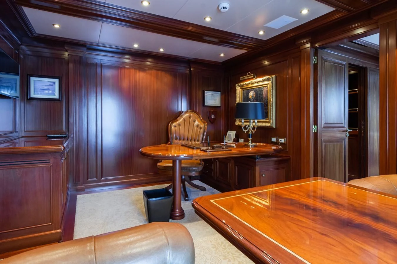 a room with a table and chairs aboard APOGEE Yacht for Sale