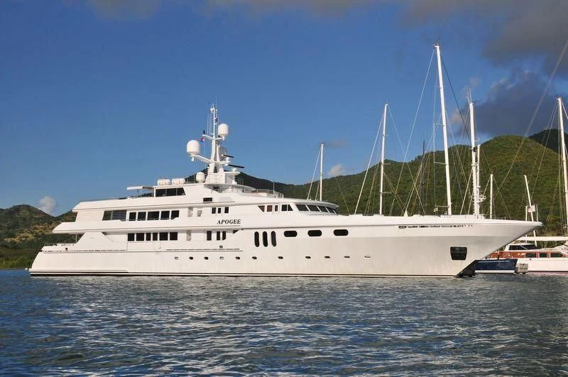 a white boat in the water aboard APOGEE Yacht for Sale