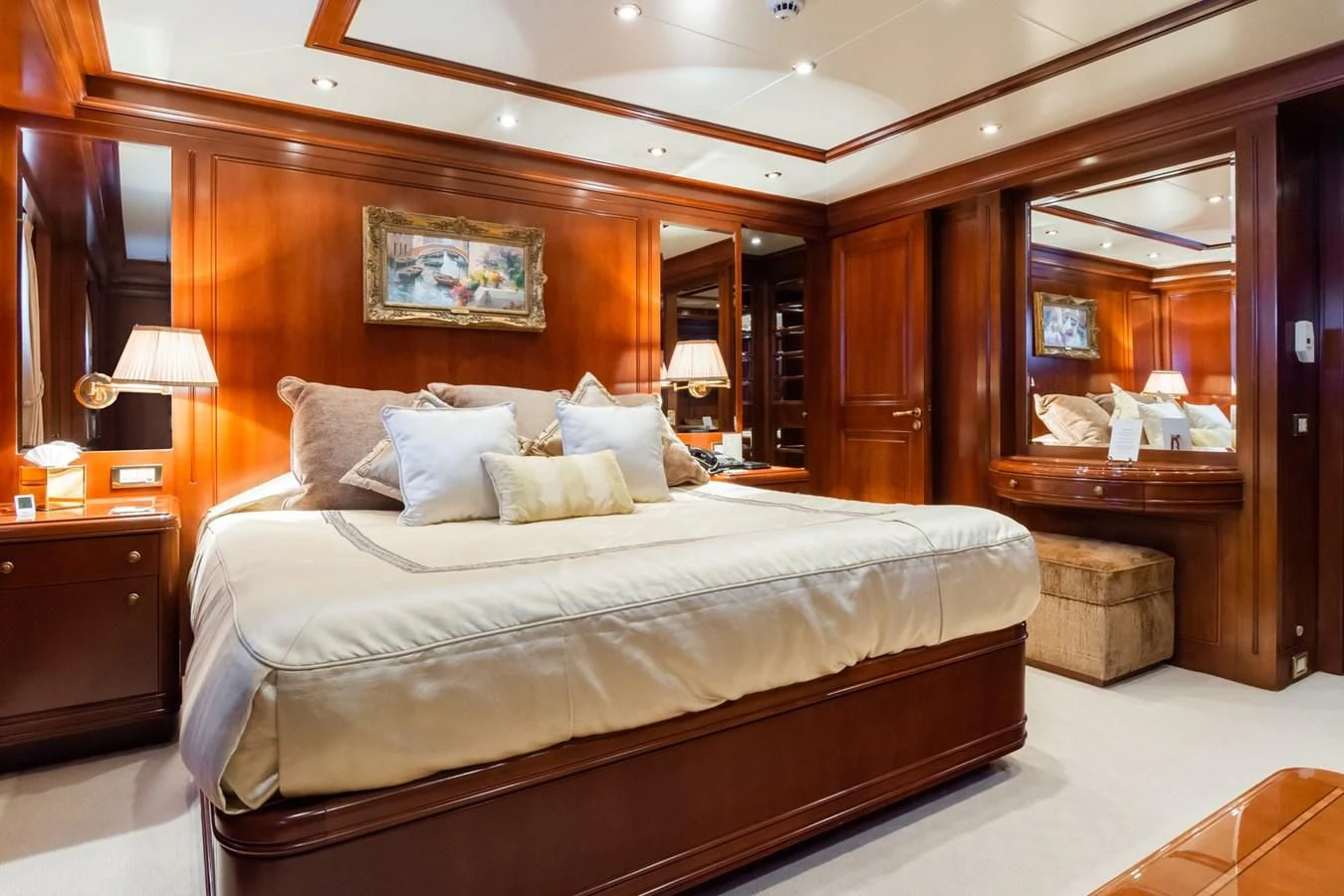 a large bed in a hotel room aboard APOGEE Yacht for Sale