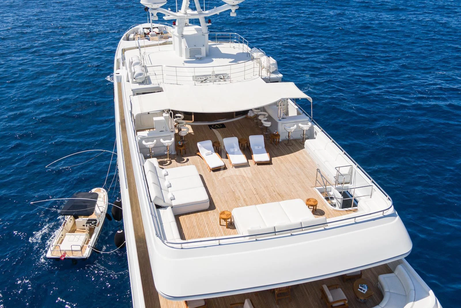 a large ship in the water aboard APOGEE Yacht for Sale