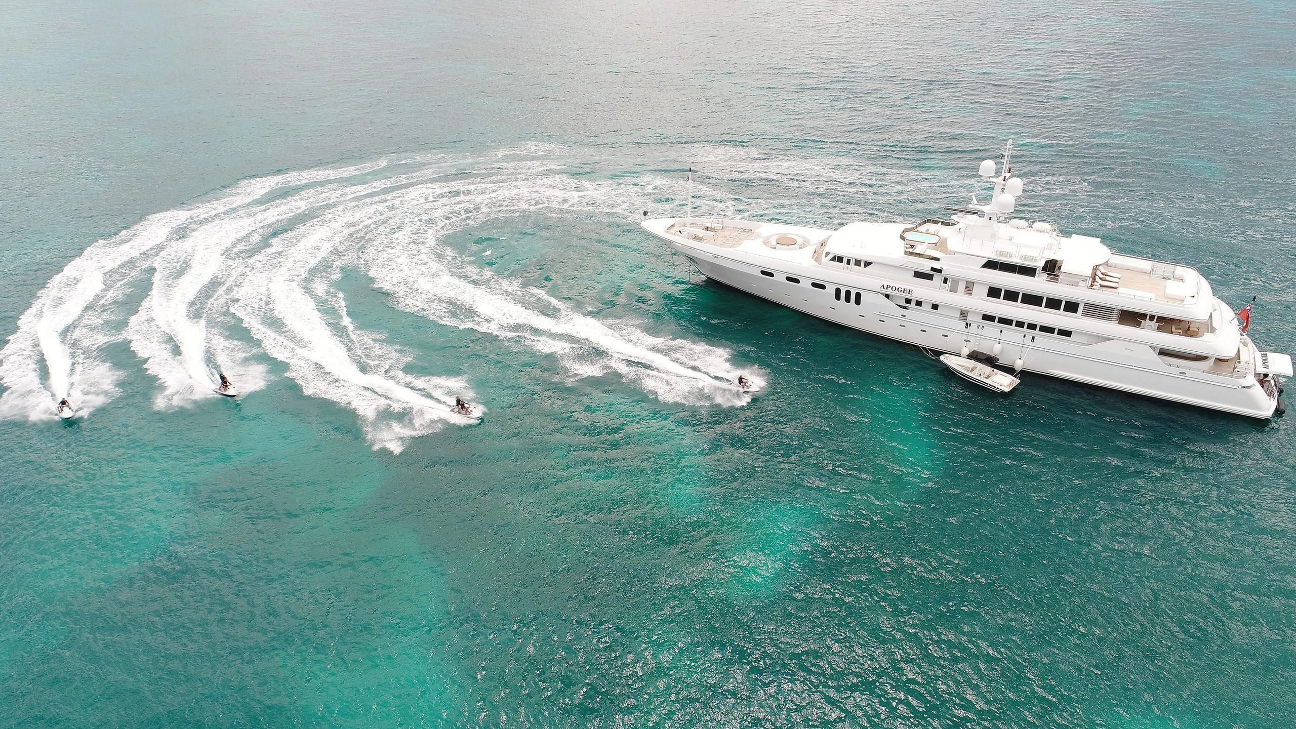 a boat in the water aboard APOGEE Yacht for Sale