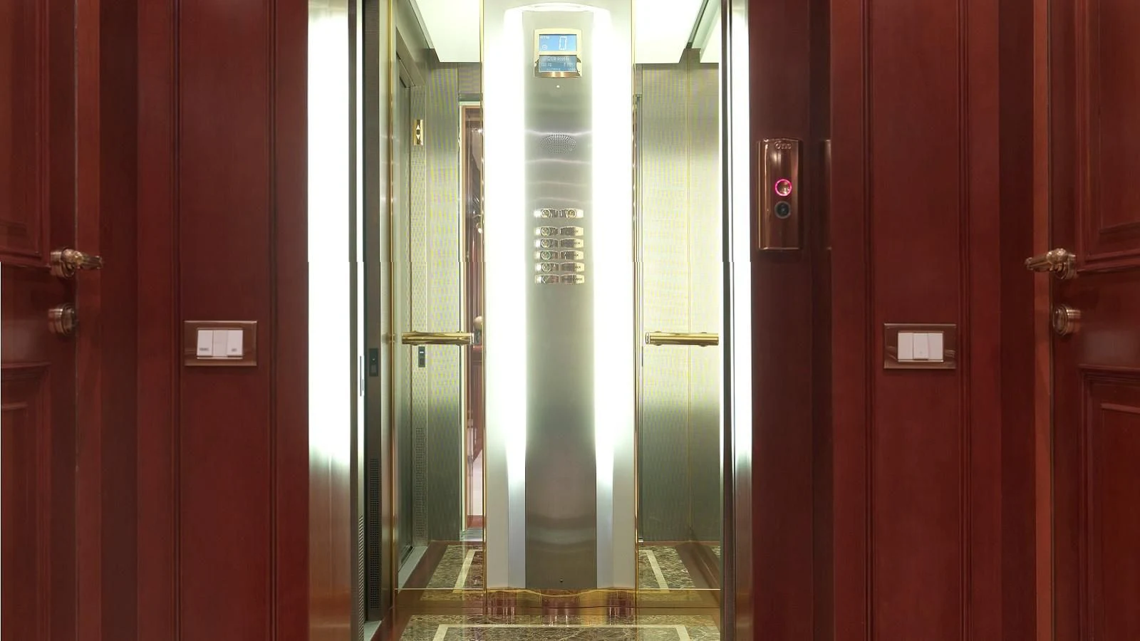 a row of elevator doors aboard APOGEE Yacht for Sale