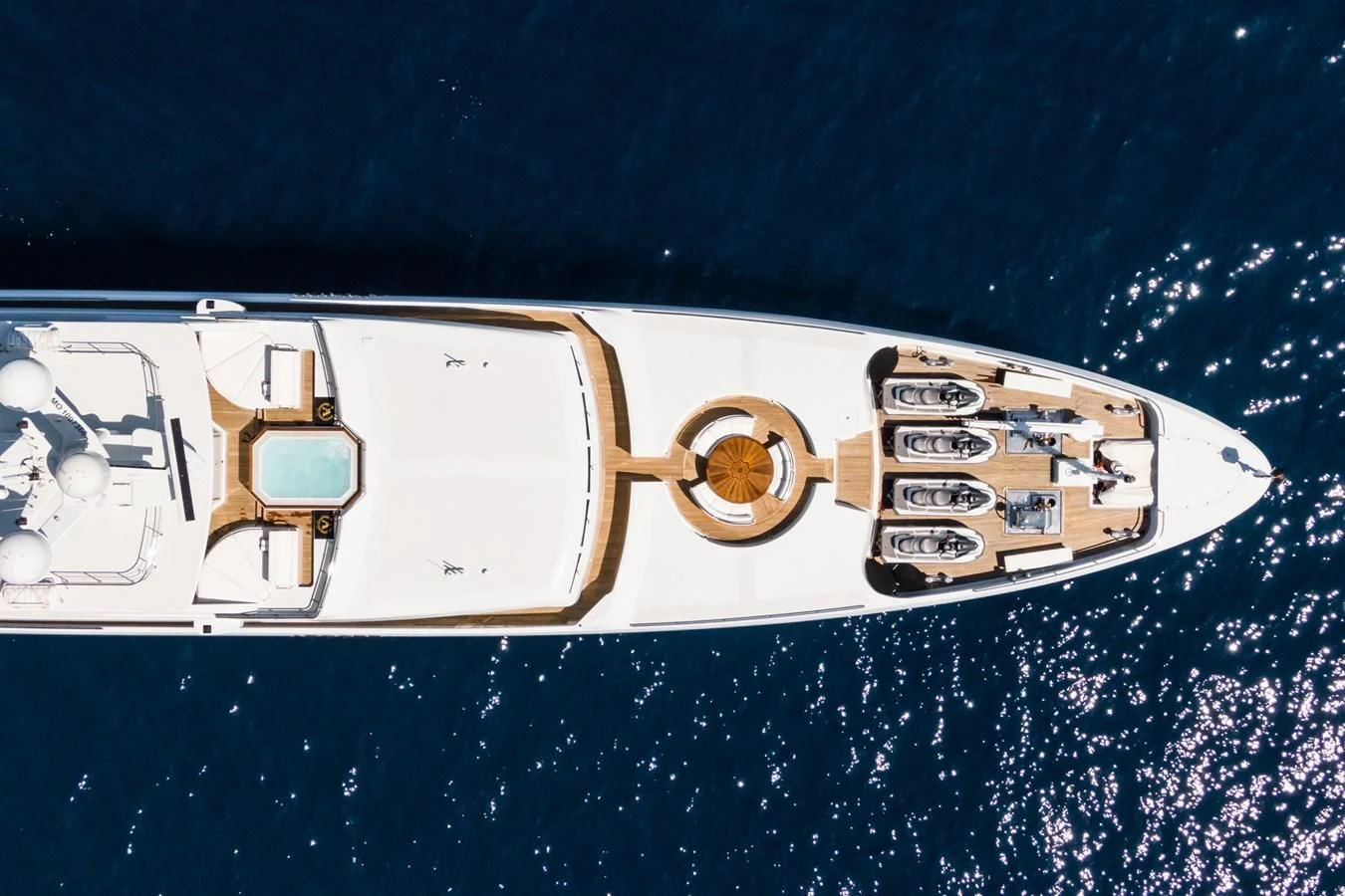 a gold and silver object with text on it aboard APOGEE Yacht for Sale