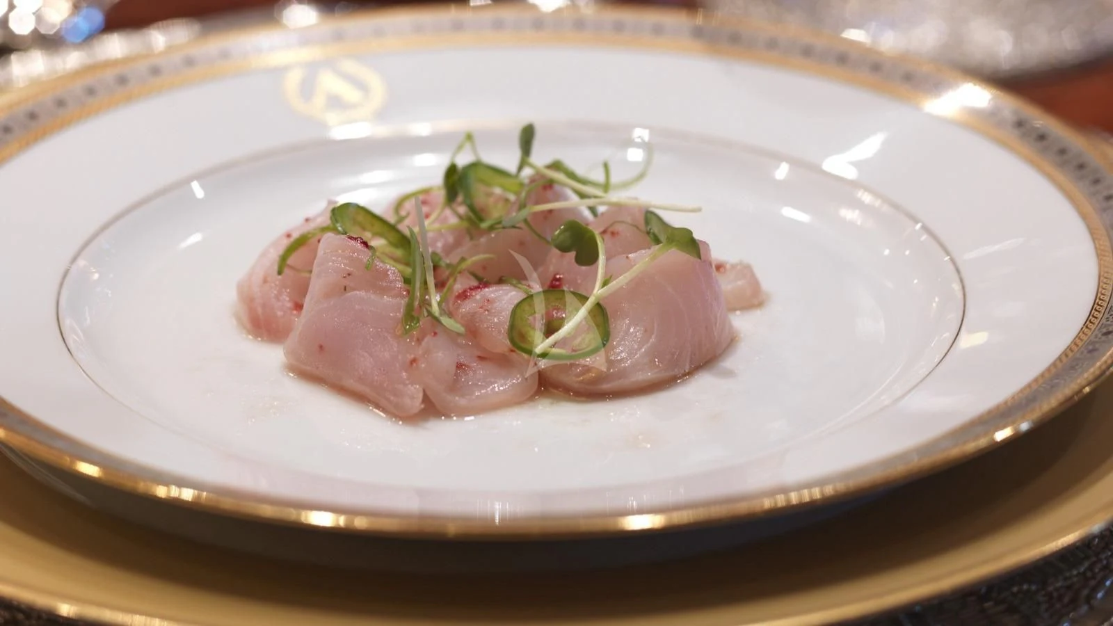 a plate of food aboard APOGEE Yacht for Sale