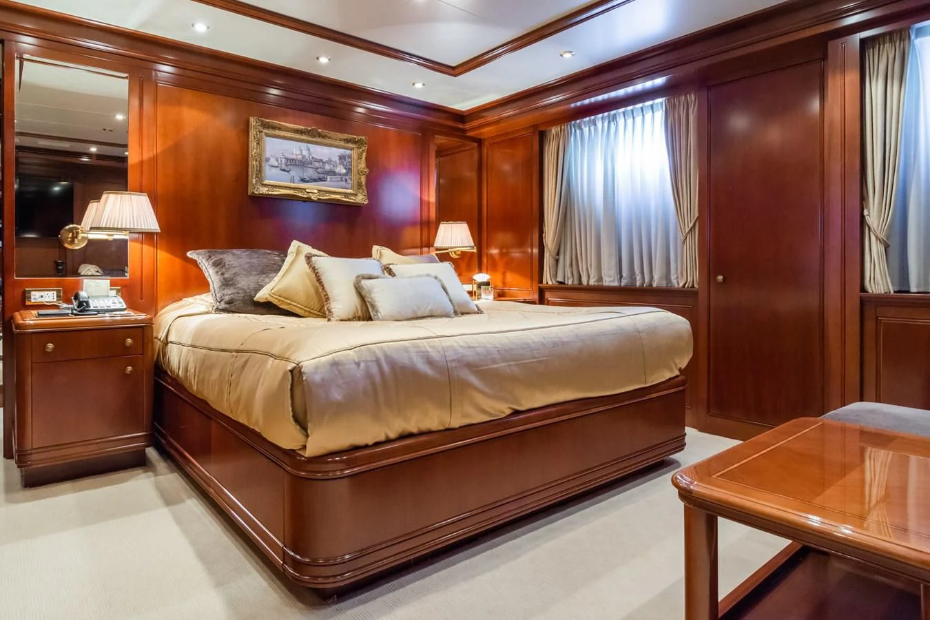 a large bed in a hotel room aboard APOGEE Yacht for Sale