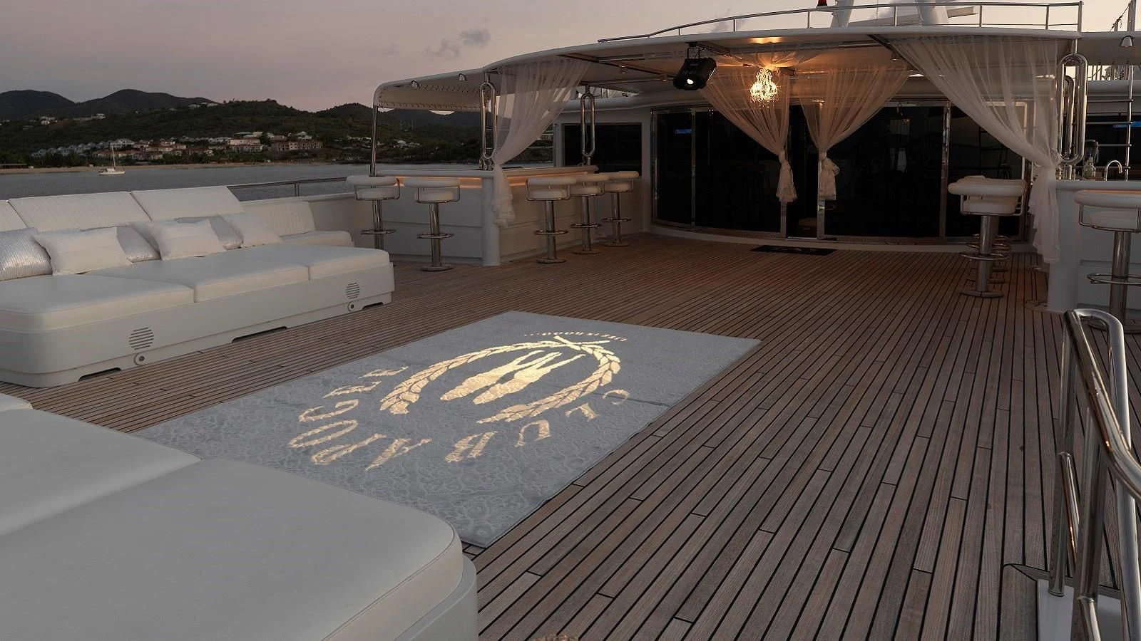 a deck with a couple of white boats on it aboard APOGEE Yacht for Sale