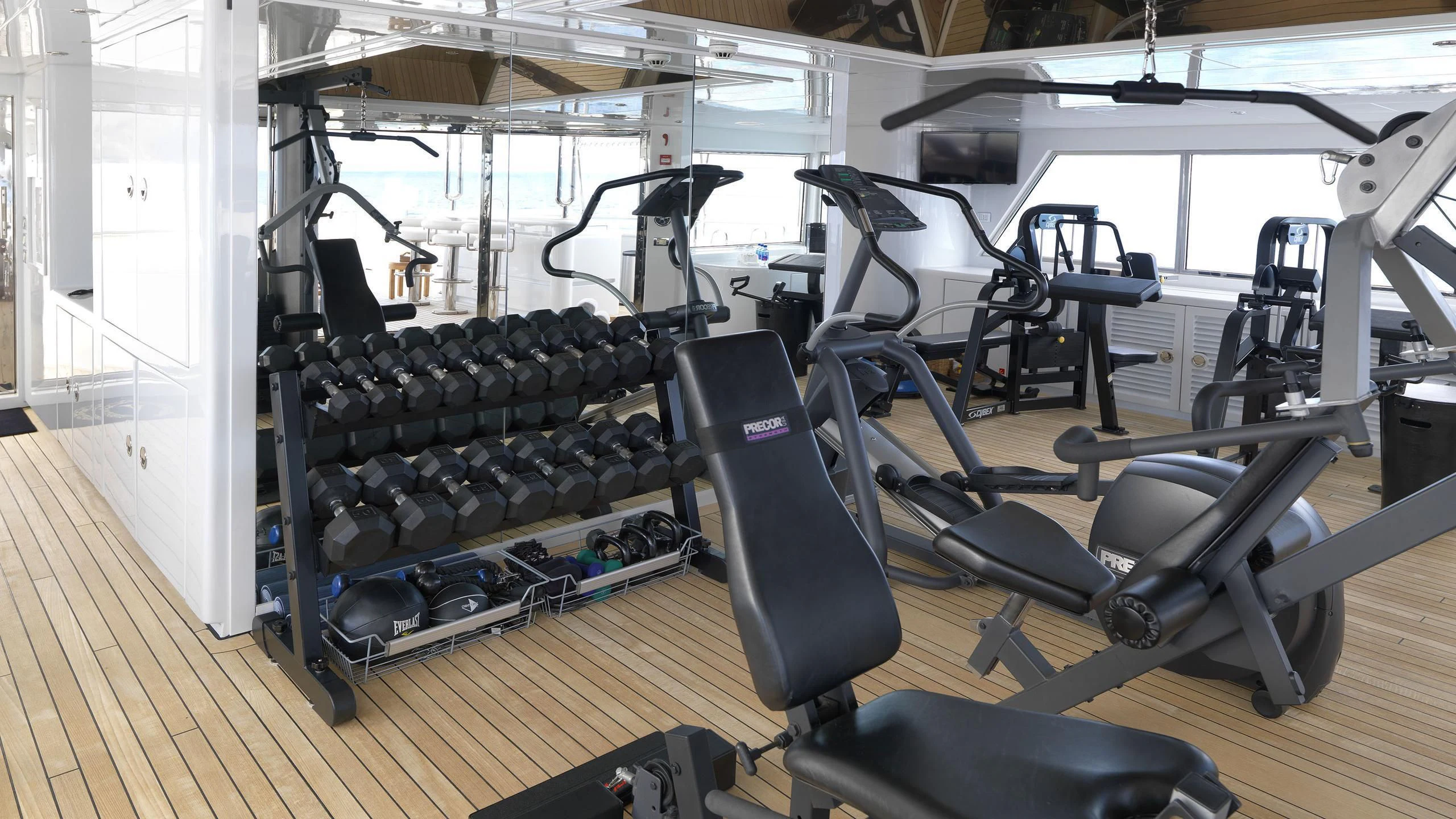 a gym with exercise equipment aboard APOGEE Yacht for Sale