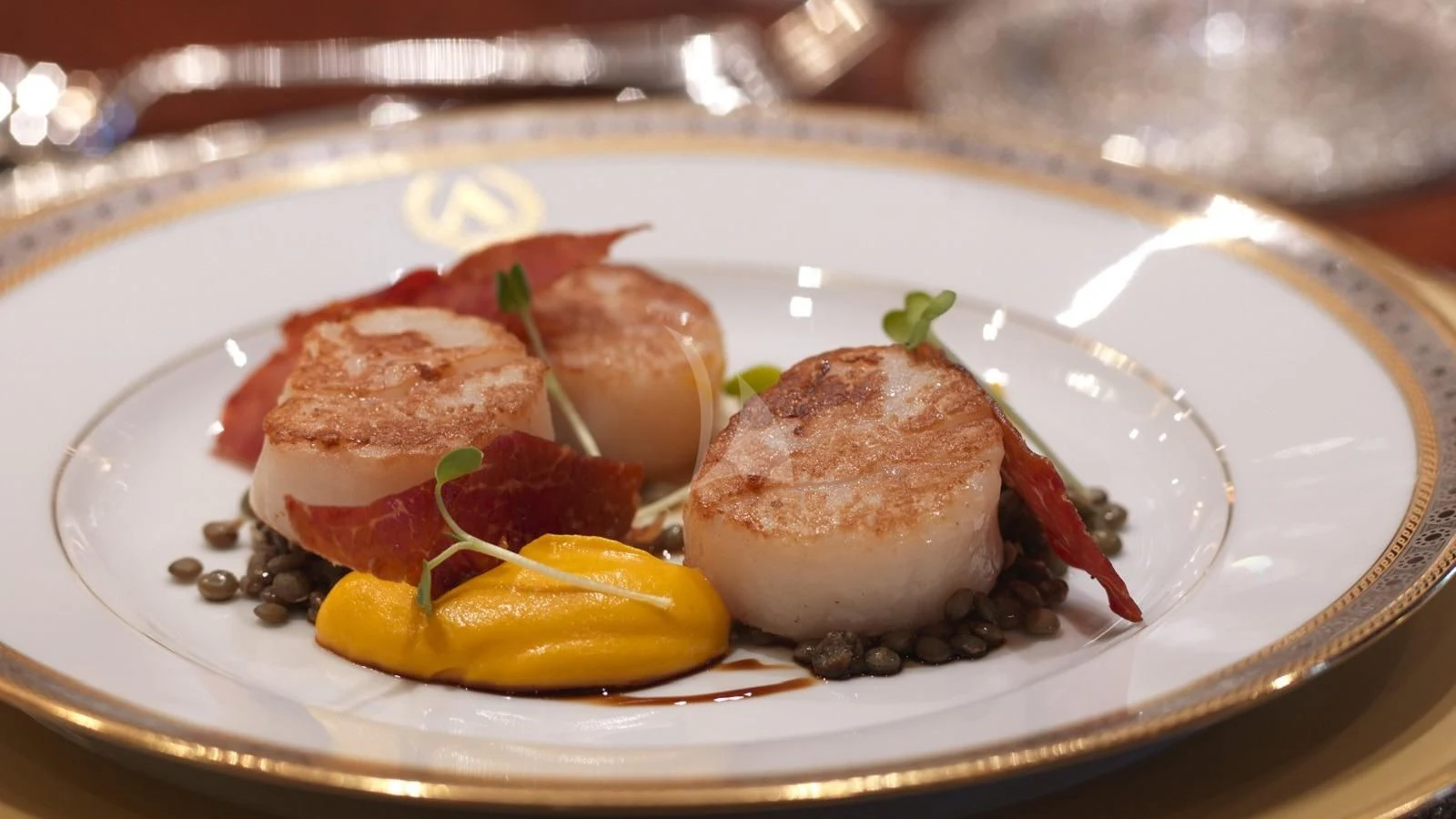 a plate of food aboard APOGEE Yacht for Sale