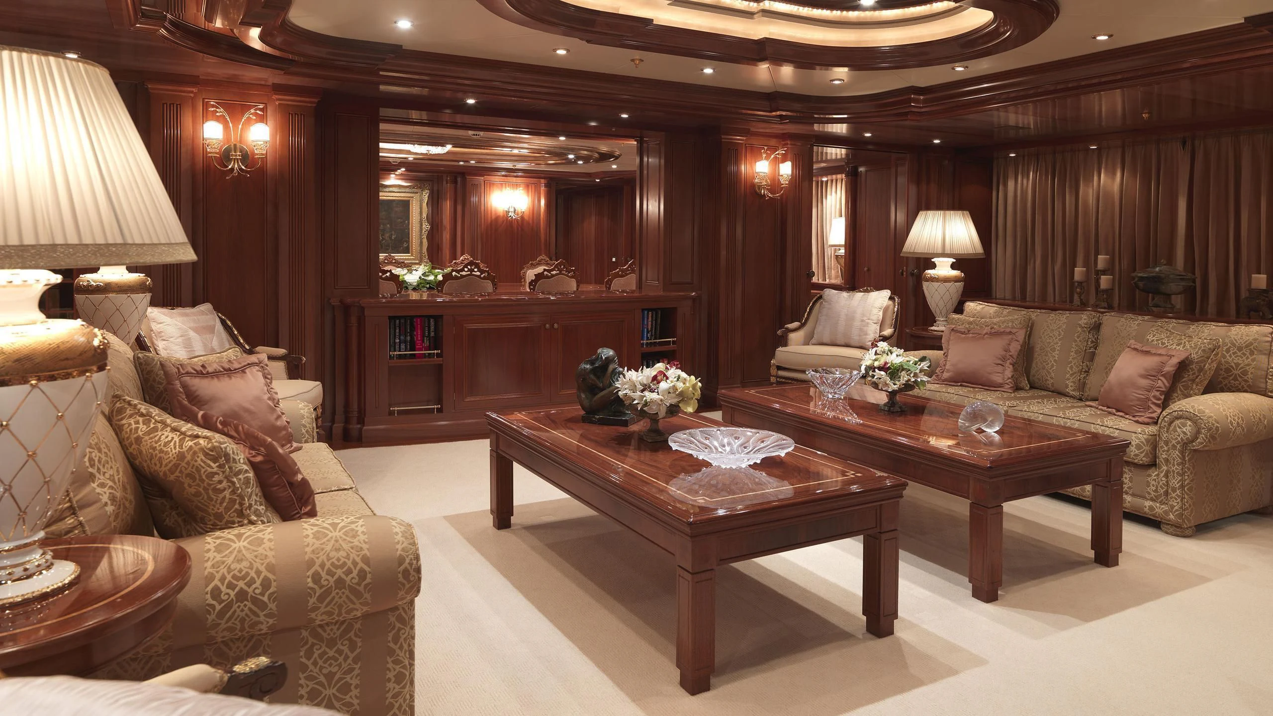 a living room with a piano and a piano aboard APOGEE Yacht for Sale