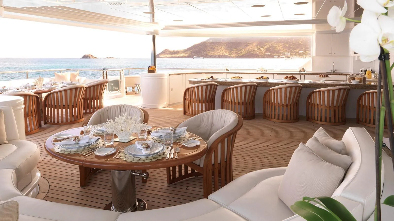 a large dining room with a table set for a meal aboard APOGEE Yacht for Sale