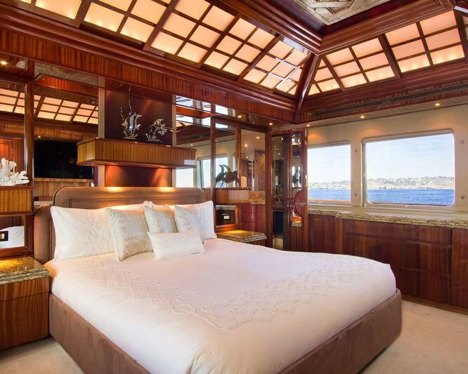 a bed in a room aboard SERENITY Yacht for Charter