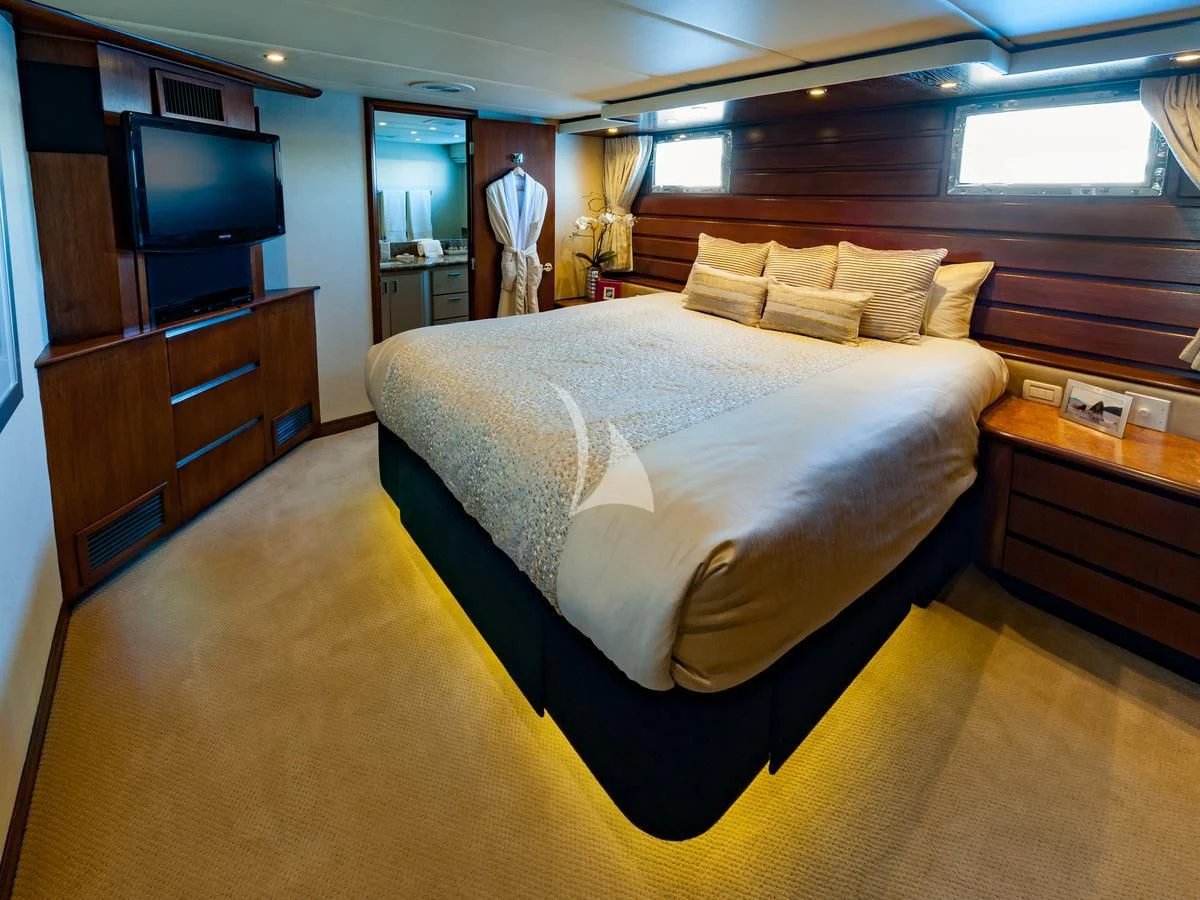 a bed in a room aboard SERENITY Yacht for Charter