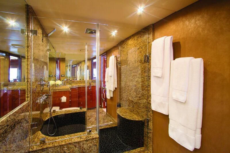 a bathroom with a large tub aboard SERENITY Yacht for Charter