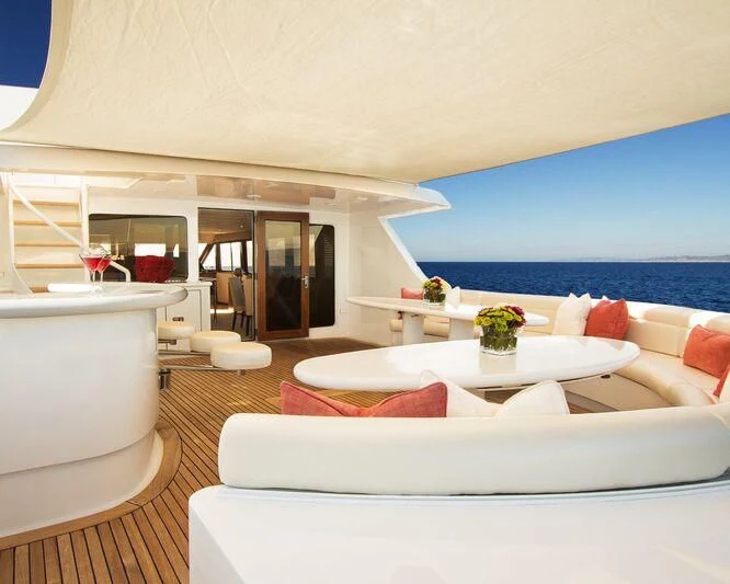 a living room with a large pool aboard SERENITY Yacht for Charter