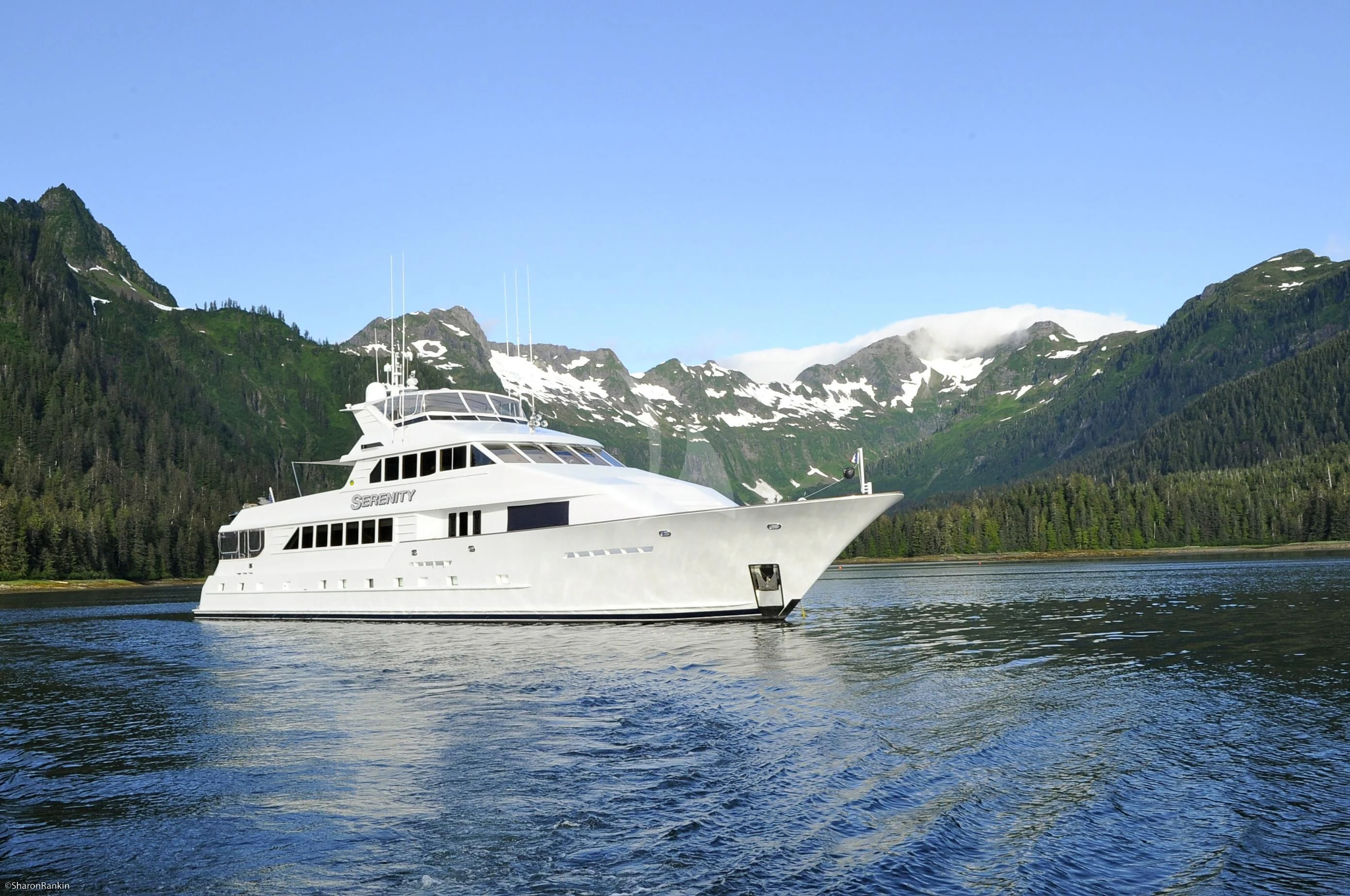 a white yacht in the water aboard SERENITY Yacht for Charter