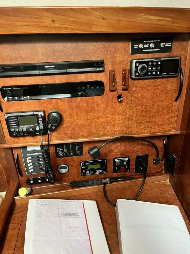 a wooden box with electronic devices aboard SERENITY Yacht for Charter
