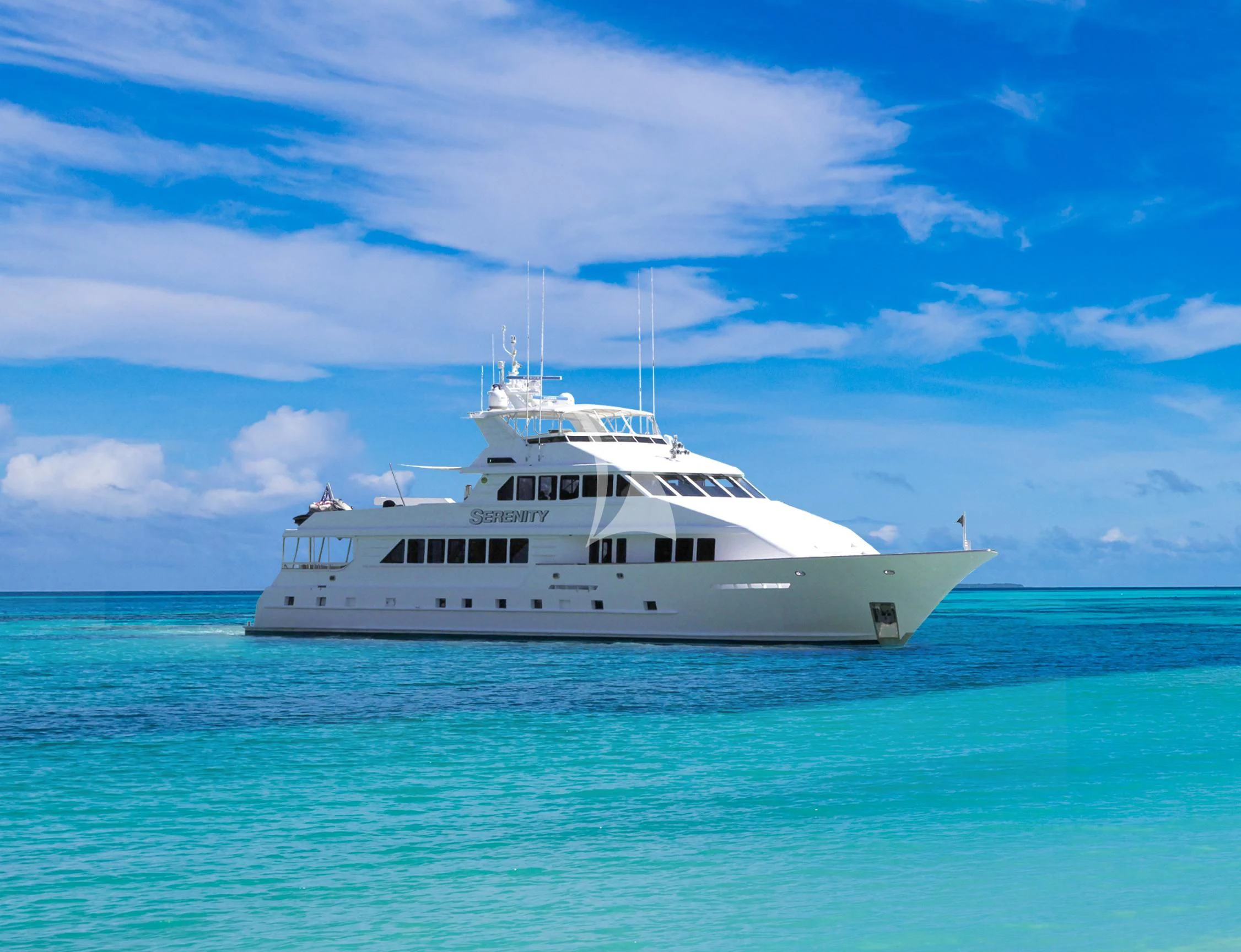 a white boat in the water aboard SERENITY Yacht for Charter