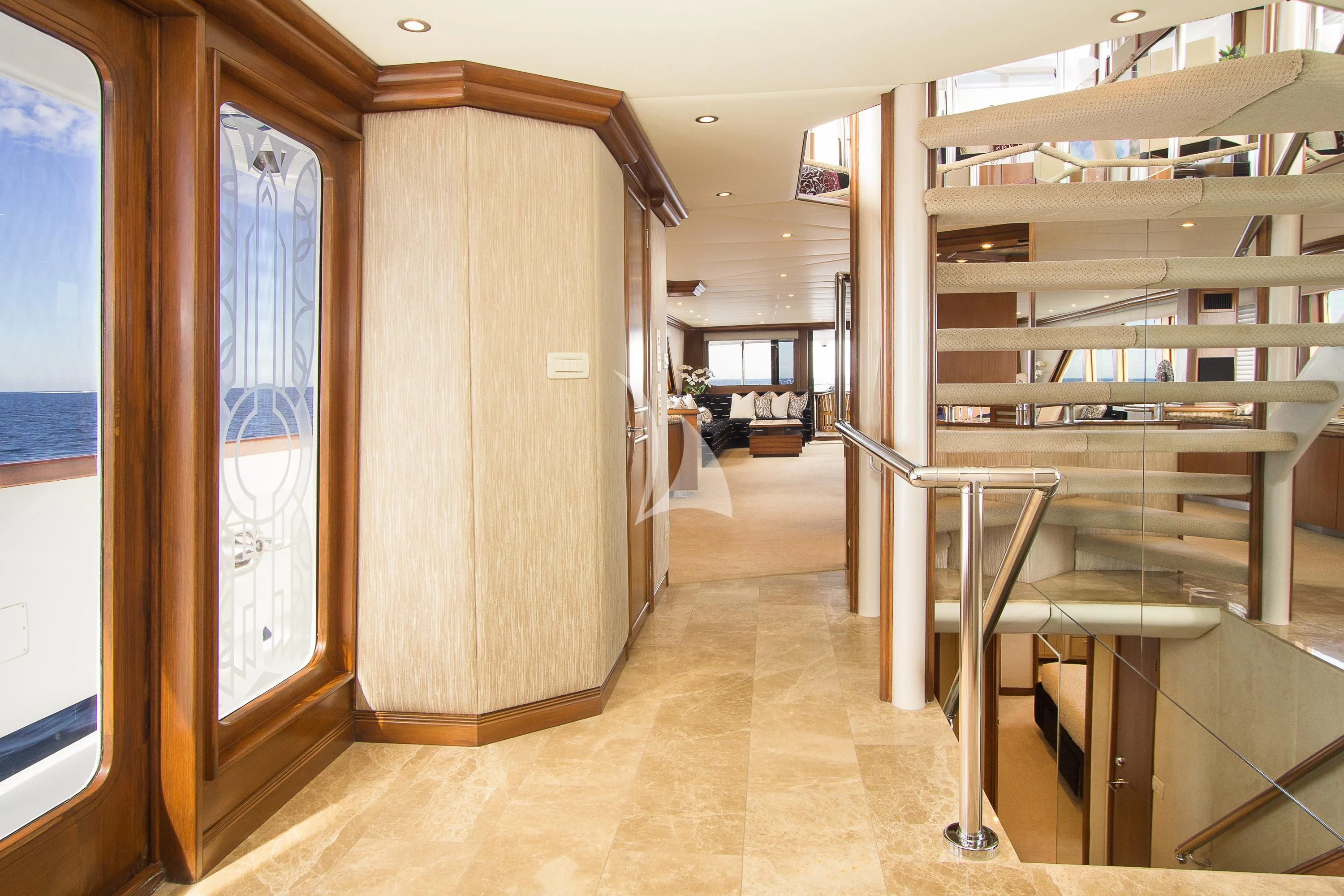 a room with a large wooden door aboard SERENITY Yacht for Charter