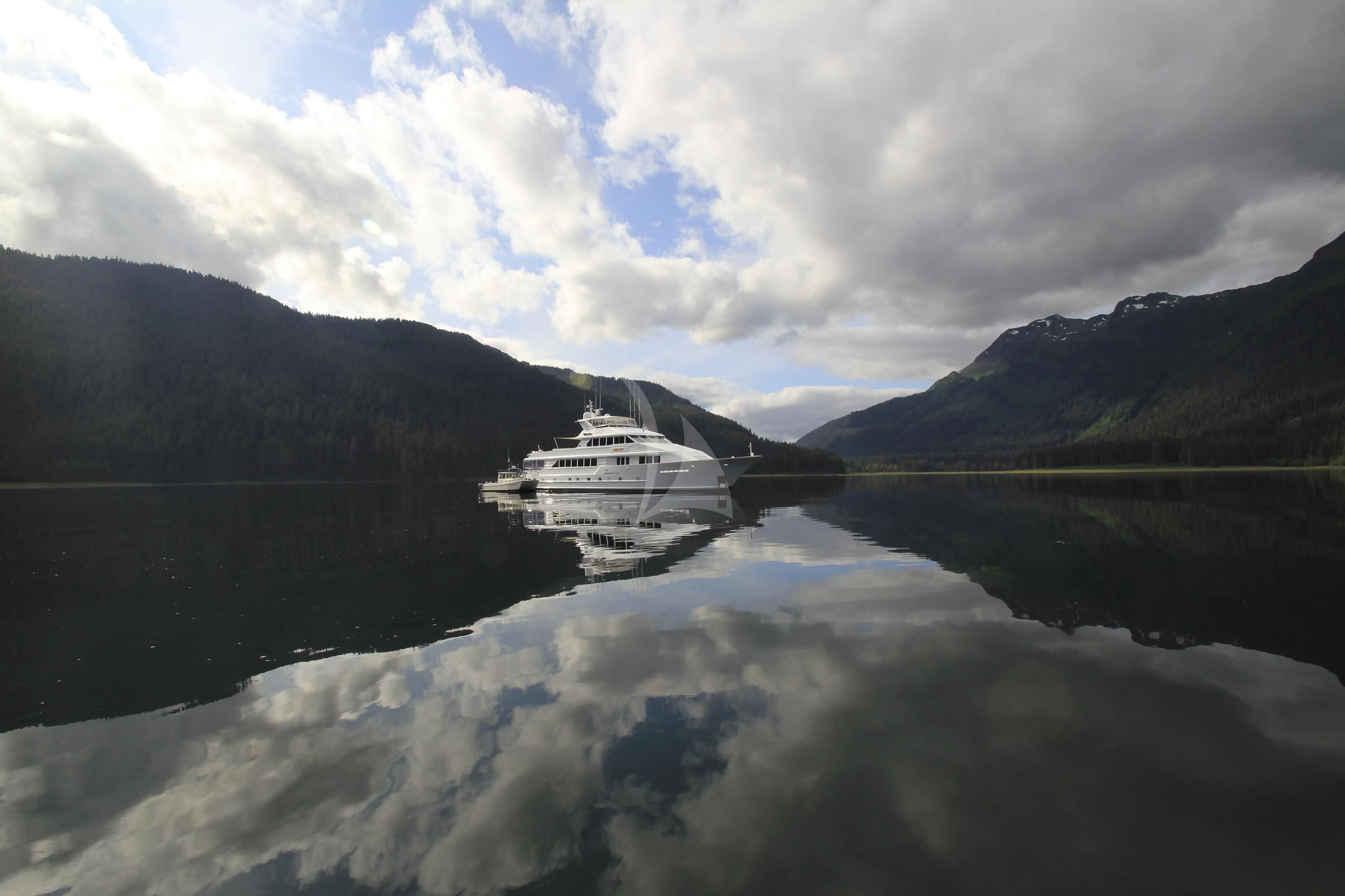 a boat on a lake aboard SERENITY Yacht for Charter