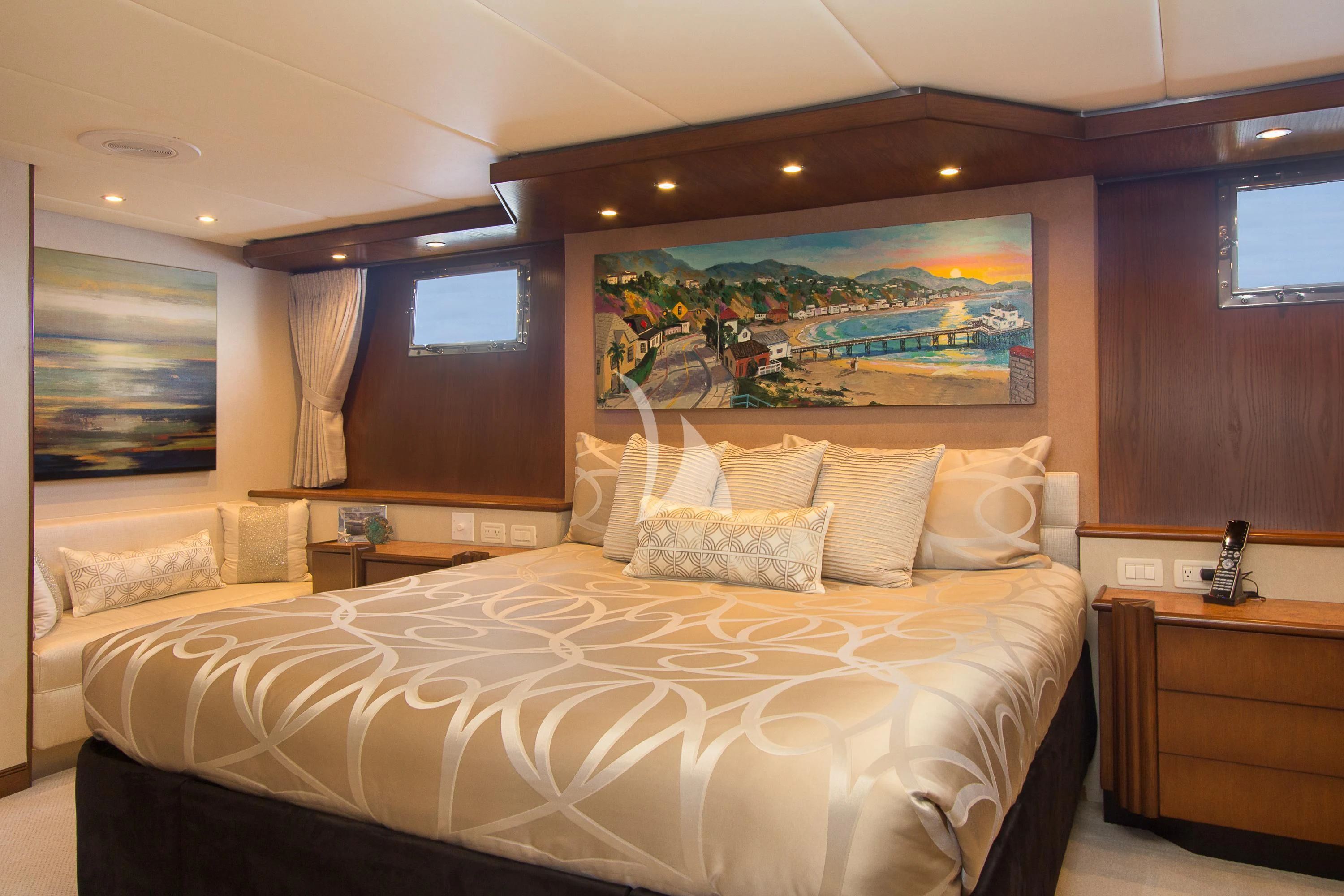a large bed in a hotel room aboard SERENITY Yacht for Charter