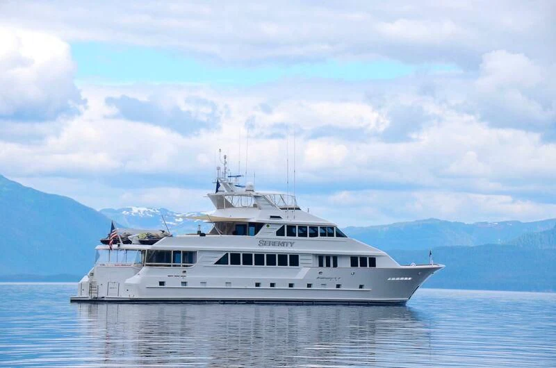 a white yacht on the water aboard SERENITY Yacht for Charter