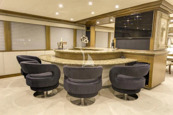 a large indoor fountain aboard SERENITY Yacht for Charter