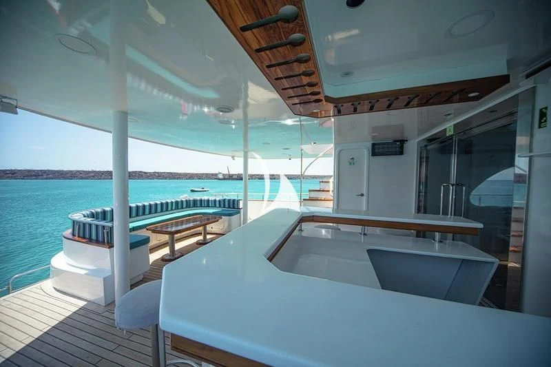 a room with a pool and a deck aboard GRAND DAPHNE Yacht for Charter