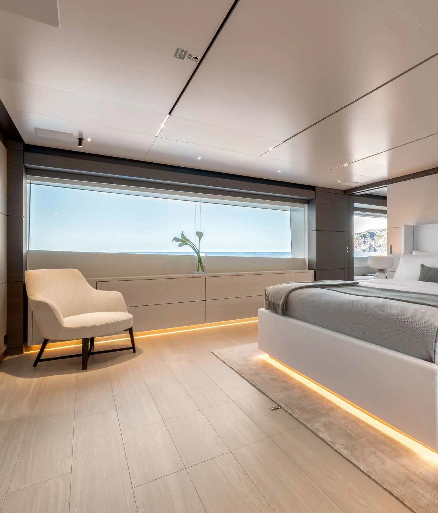 a room with a couch and a chair aboard PALOMA Yacht for Sale