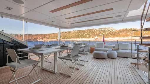 a large patio with a pool and a deck aboard PALOMA Yacht for Sale