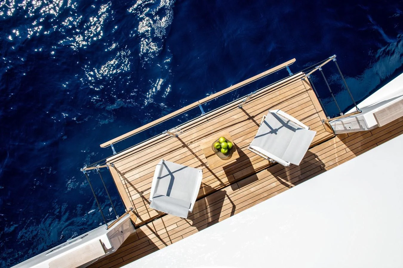 a house with a deck and a pool and trees aboard PALOMA Yacht for Sale