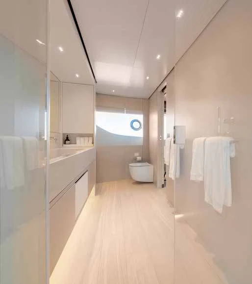 a bathroom with a large mirror aboard PALOMA Yacht for Sale