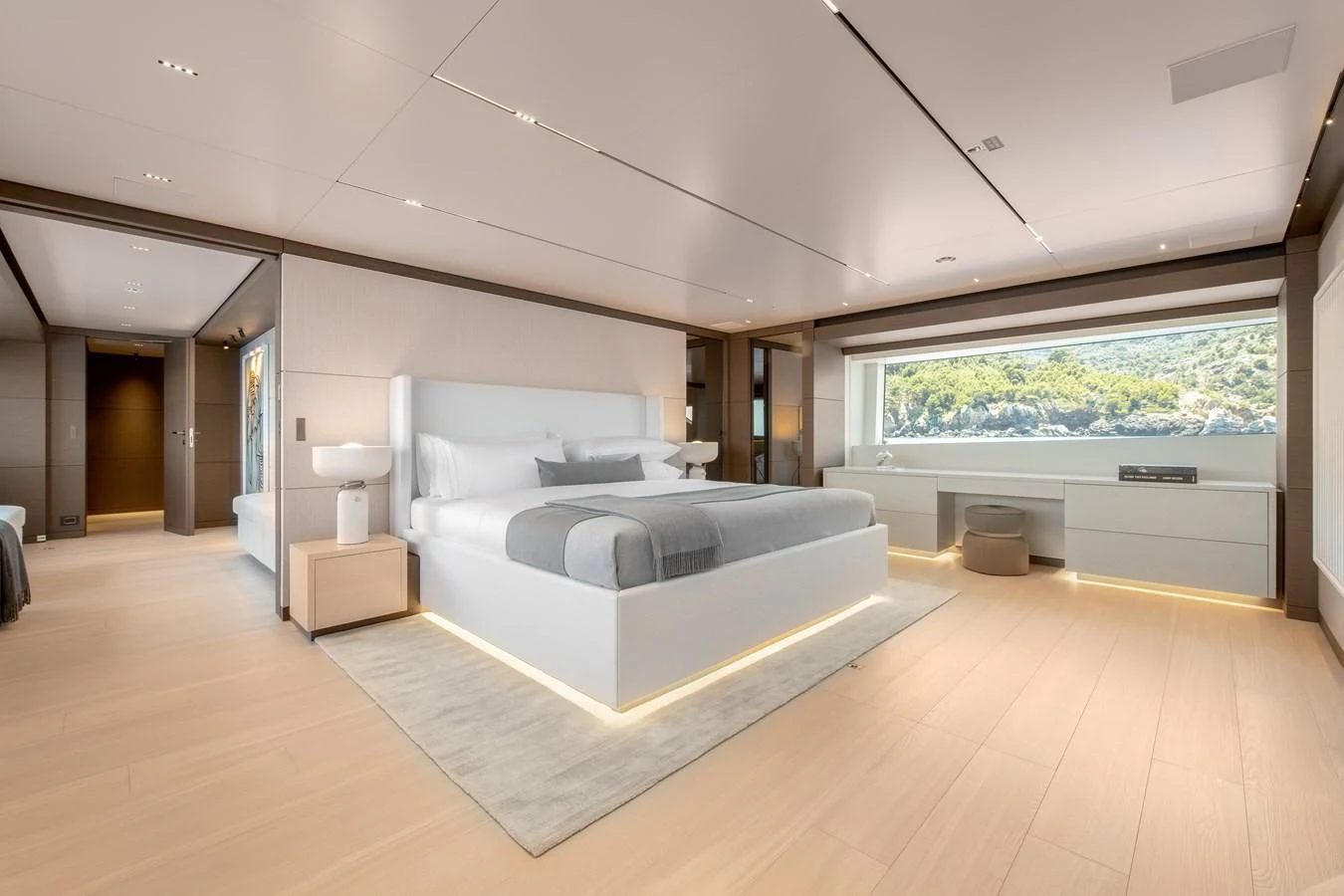 a large white bed in a room aboard PALOMA Yacht for Sale
