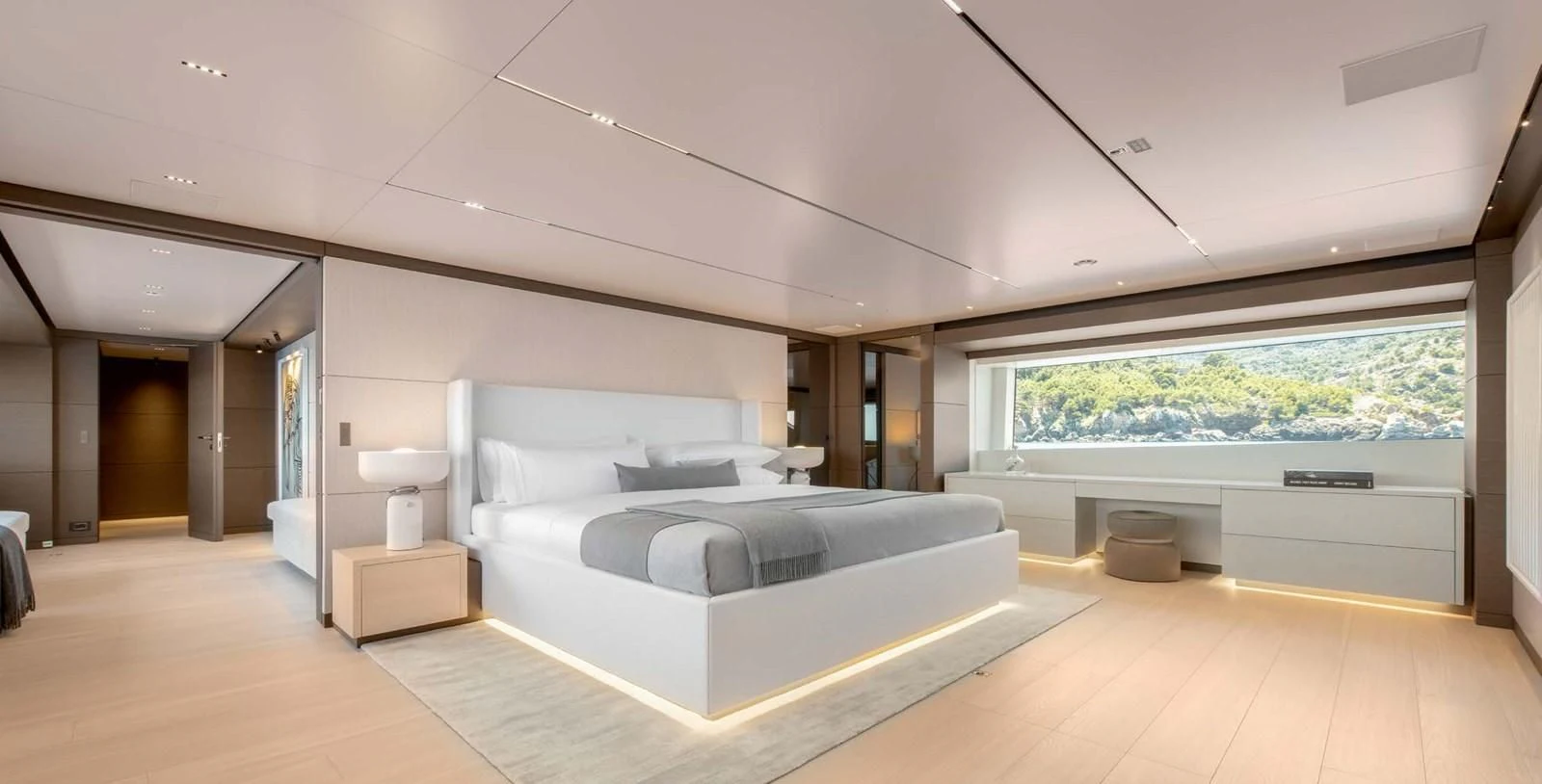 a large white bed in a room aboard PALOMA Yacht for Sale