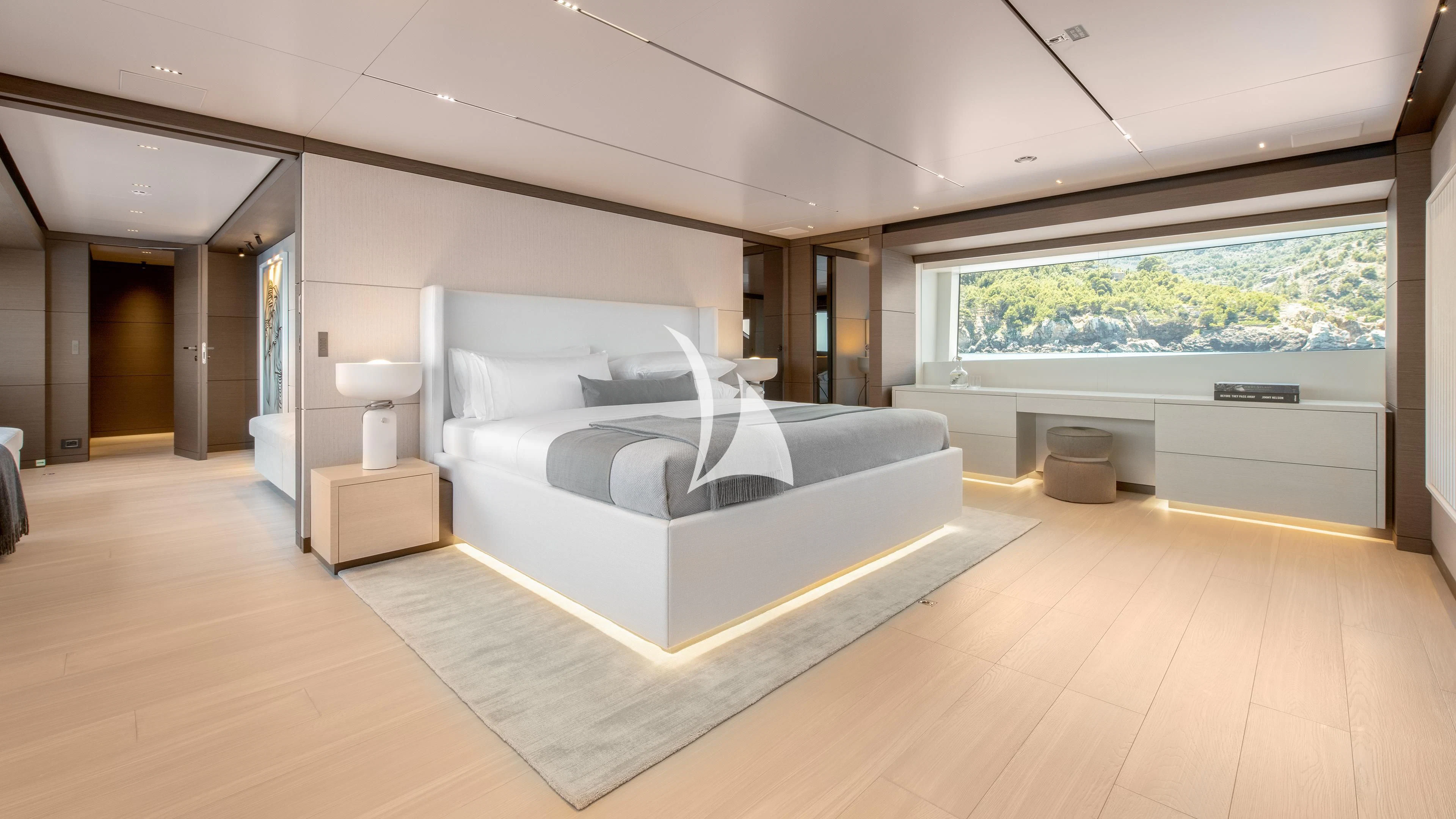 a large white bed in a room aboard PALOMA Yacht for Sale