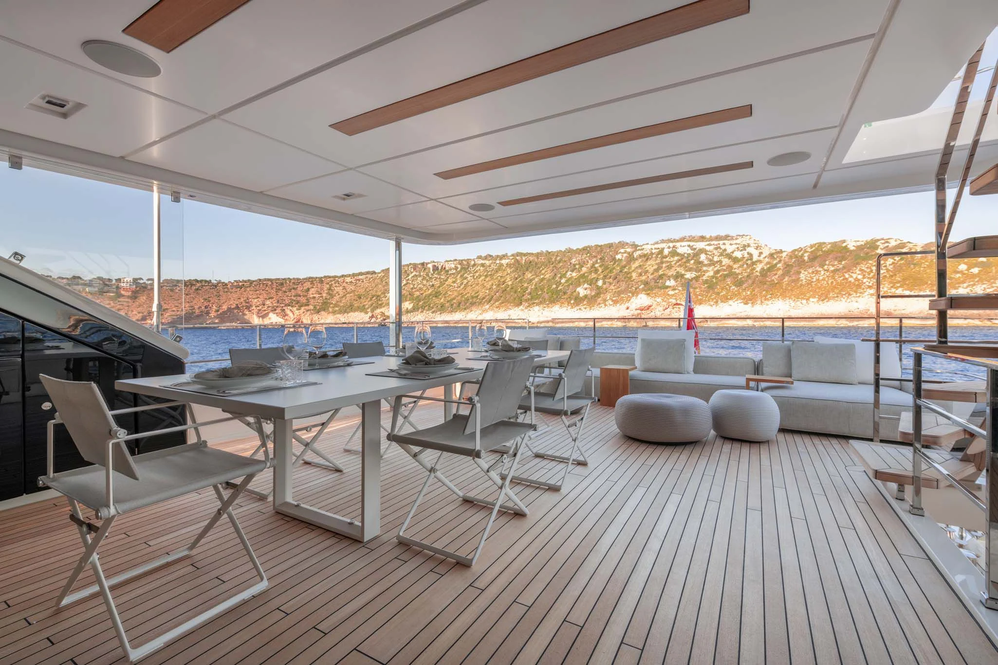 a deck with a view of the water and the city aboard PALOMA Yacht for Sale